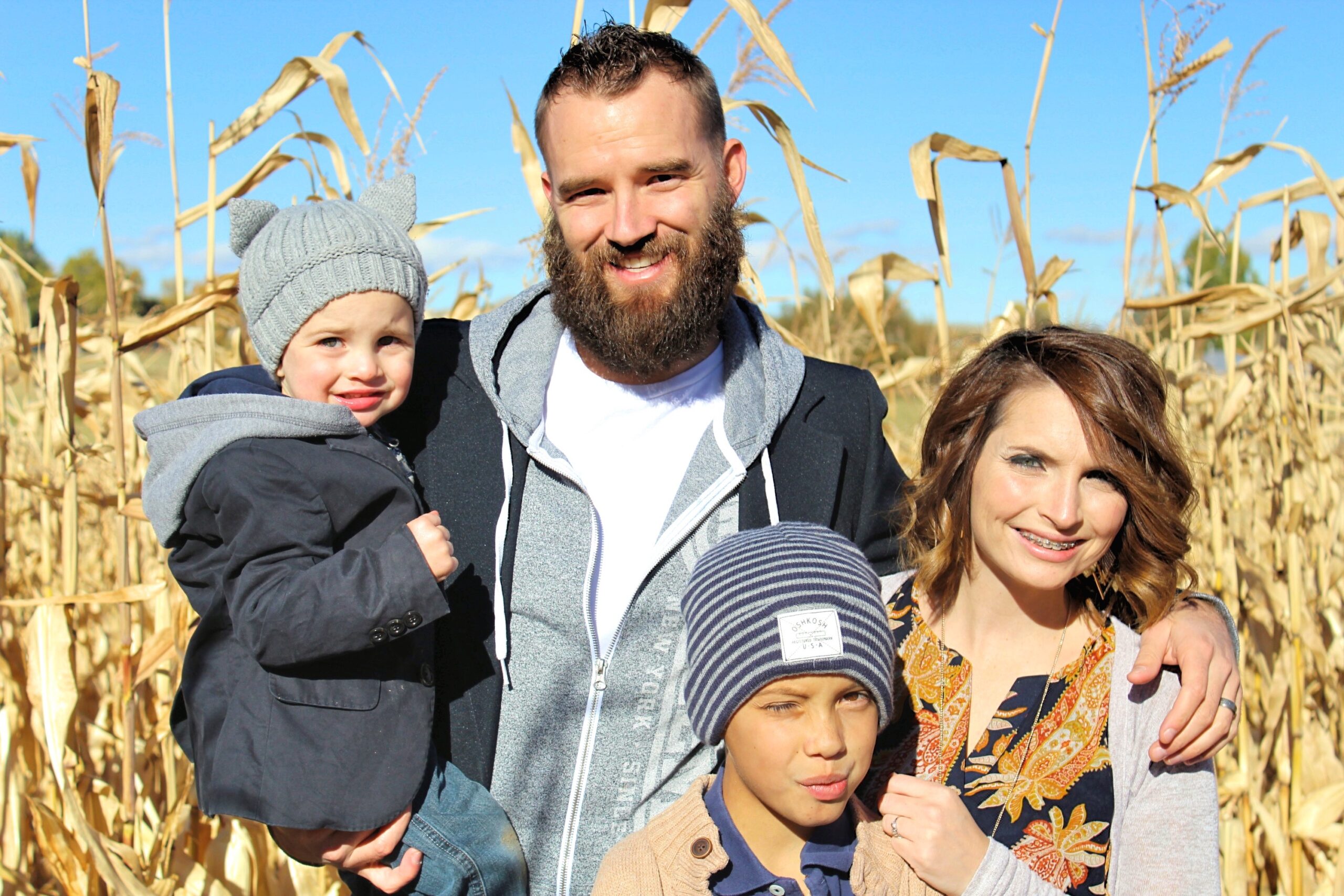 The Hugus Family in a corn maze.