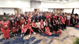 A large group photo of advocates wearing red at the AHA's 2024 Hearts on the Hill event in Washington, D.C.