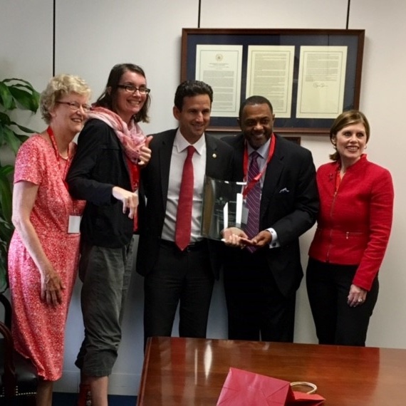 Meg and Sarah with Senator Schatz.