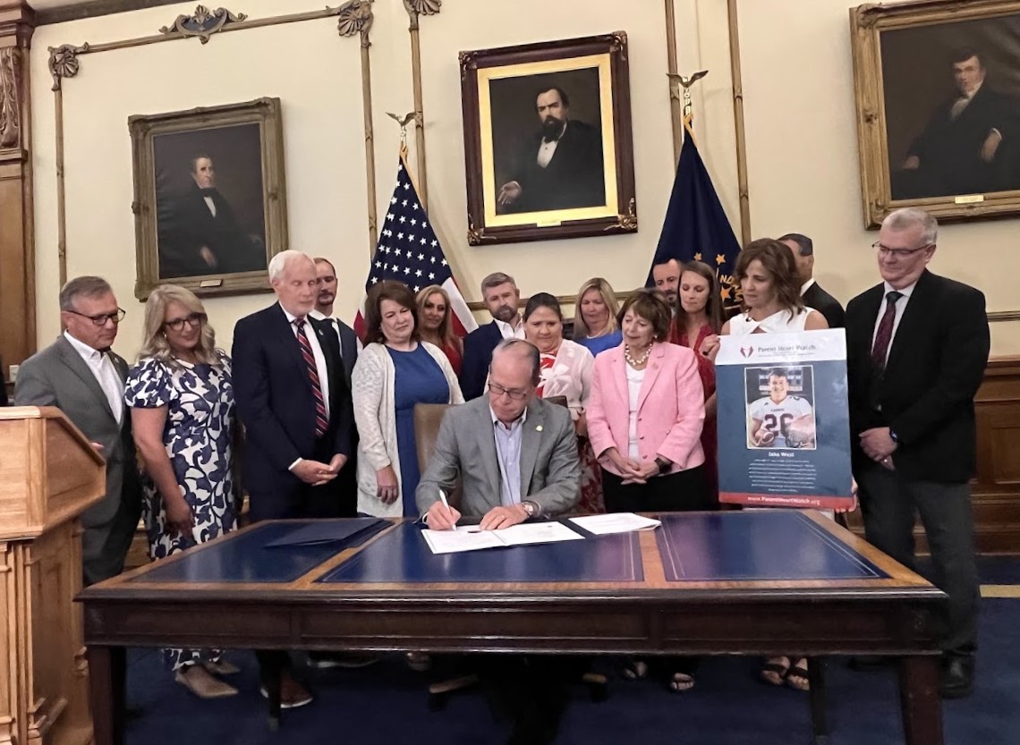 Photo of Governor Mike Braun signing HB 1515 into law.