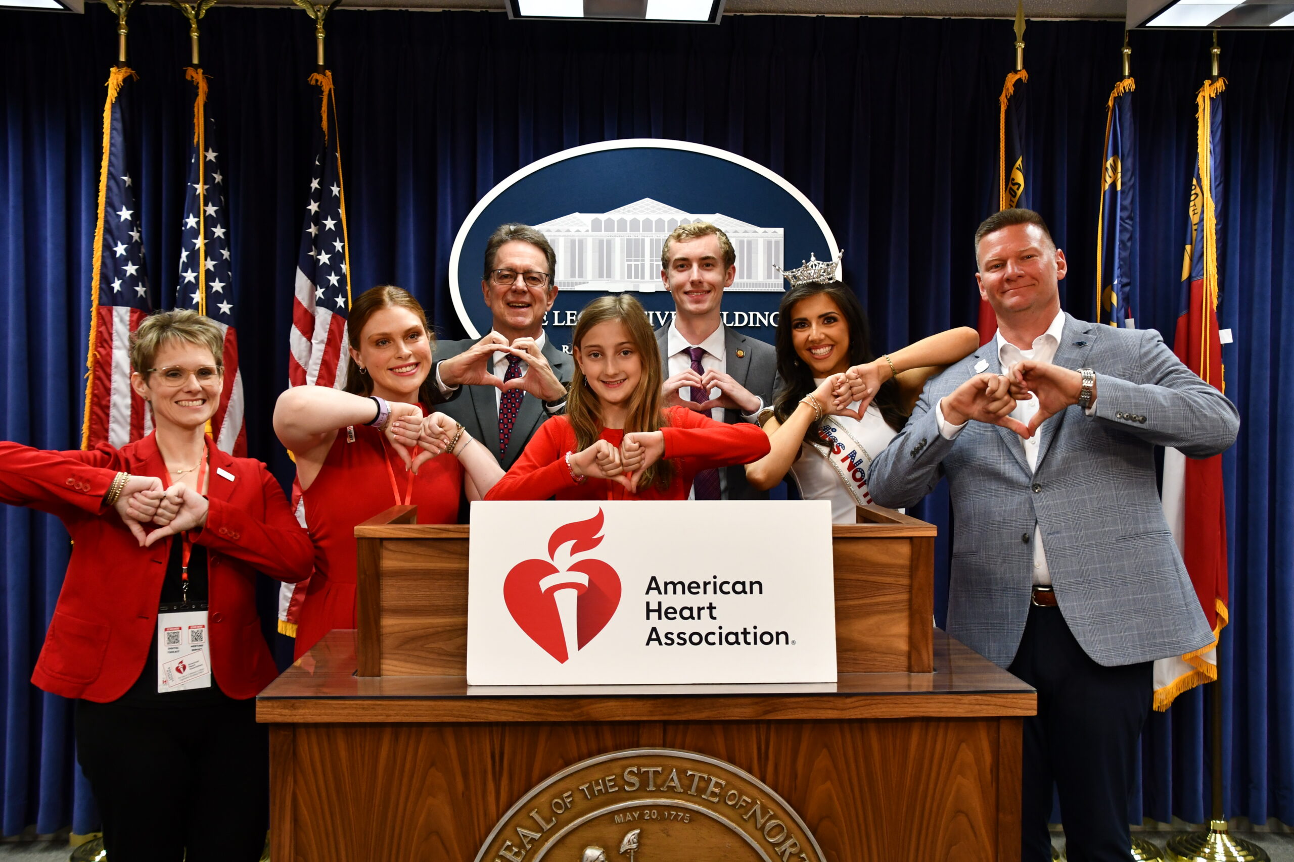 Advocates making heart hands
